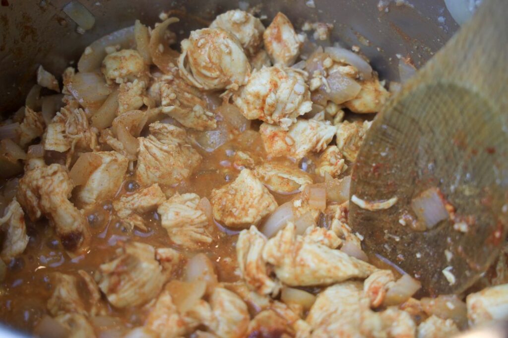 Chicken with spices inside the instant pot.