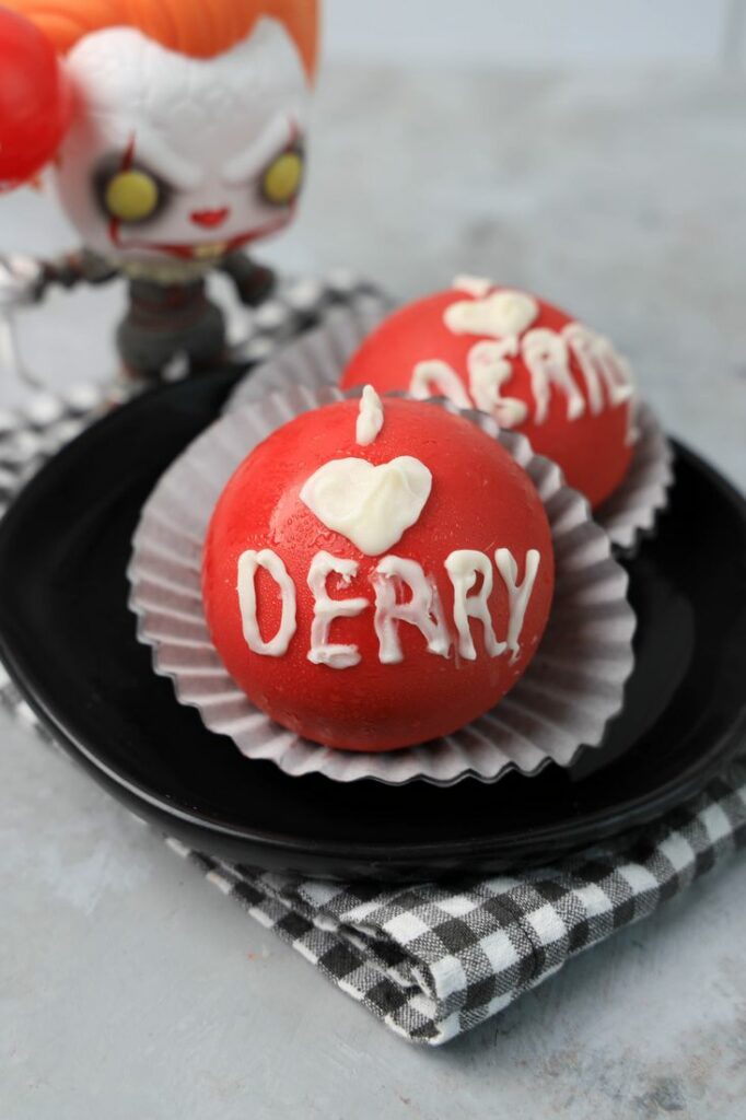 The beautiful but menacing Derry. It Derry hot chocolate bombs display the I Heart Derry on them for creepy fun.