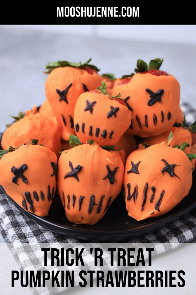 Strawberries covered in orange candy melts and decorate with black candy melts to look like the pumpkin from Trick 'R Treat.