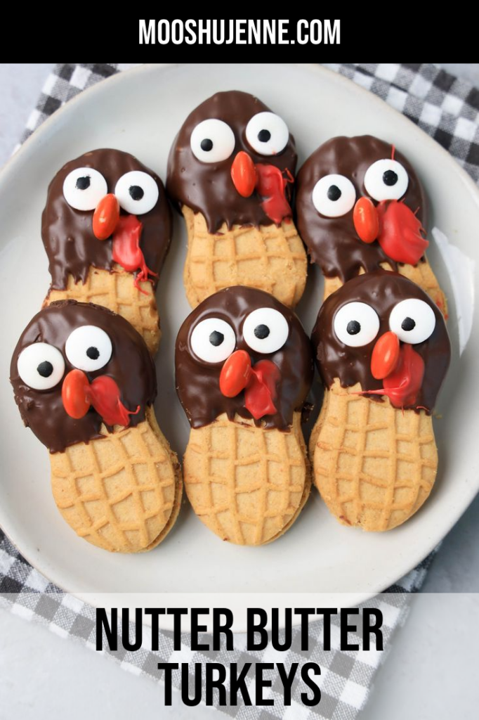 Nutter butter cookies dipped in chocolate with eyes and nose added to look like a turkey.