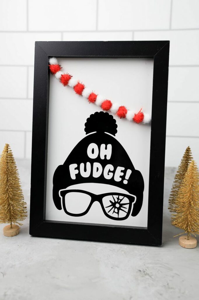 Oh Fudge A Christmas Story Cricut Frame with the beanie and shot out glasses and Oh fudge on the hat.