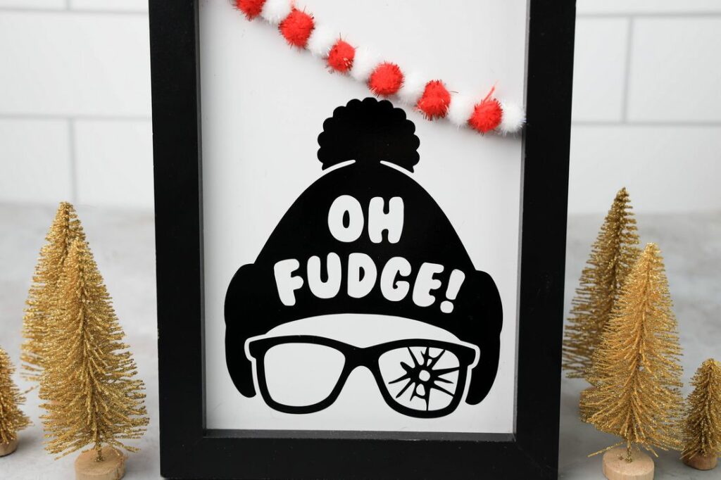 Oh Fudge A Christmas Story Cricut Frame with the beanie and shot out glasses and Oh fudge on the hat.