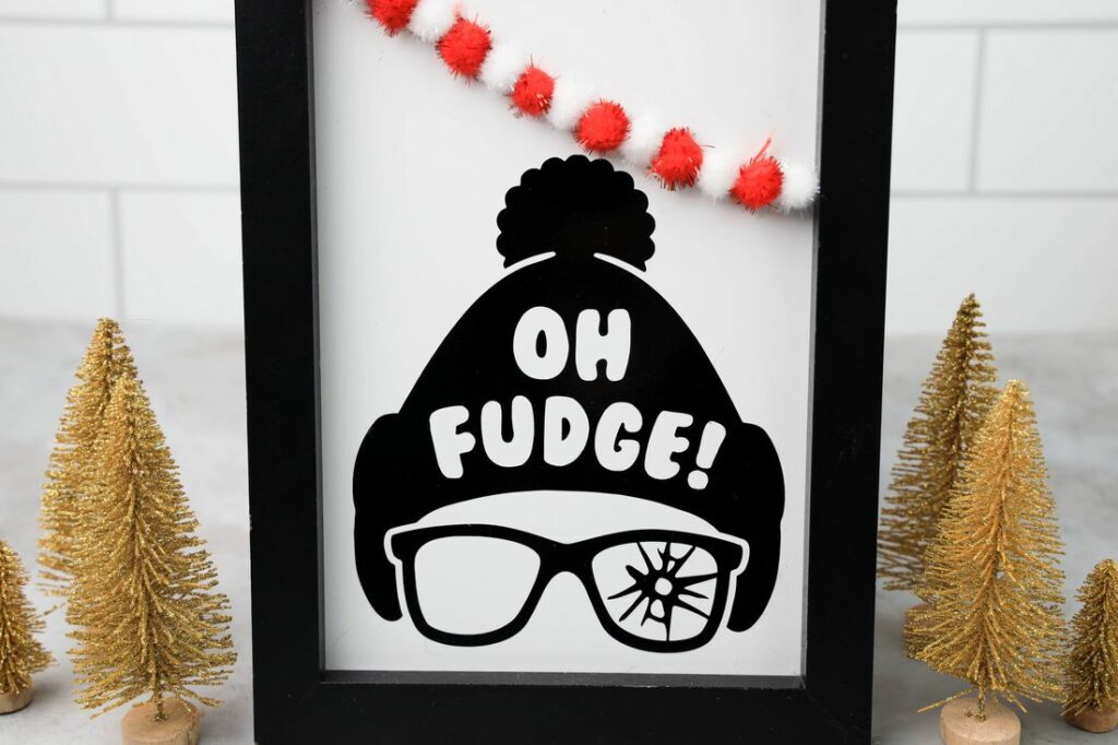 Oh Fudge A Christmas Story Cricut Frame with the beanie and shot out glasses and Oh fudge on the hat.