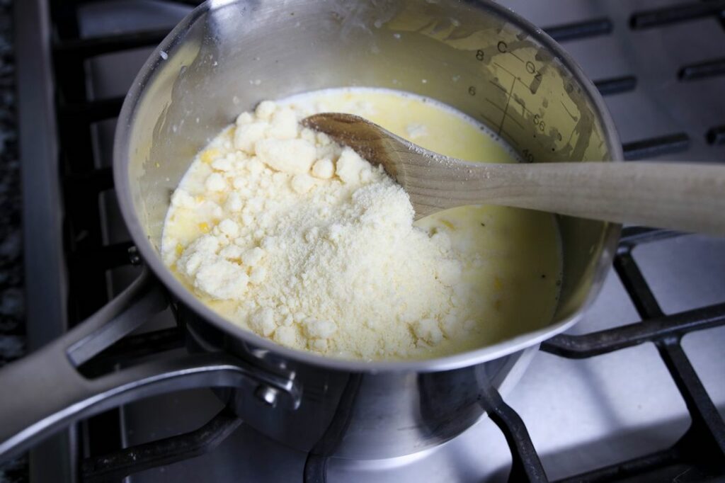 Parmesan over the creamed corn mixture inside the pot.