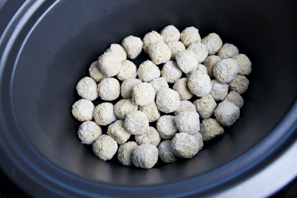 Frozen meatballs in a crockpot.