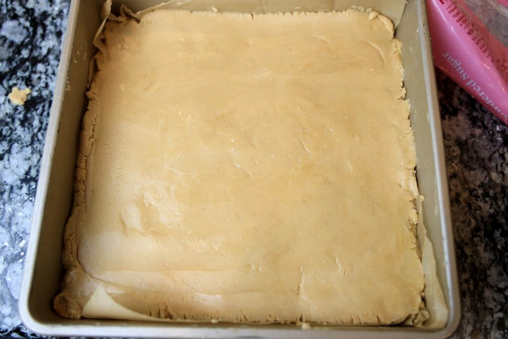 Peanut butter fudge in a 9x9 baking pan.