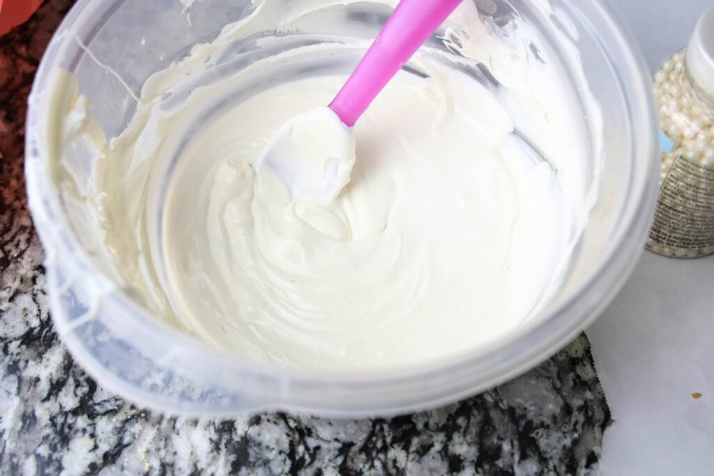 White chocolate melted in a microwave safe bowl.