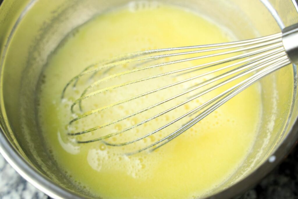 Yellow island pineapple jello mixed with water and sweetened condensed milk.