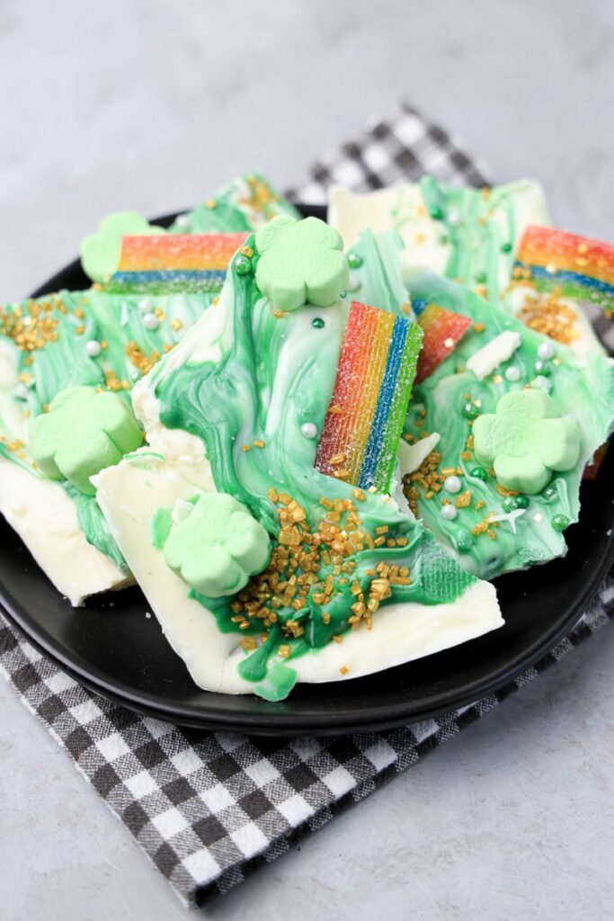 Lucky Leprechaun Bark on a black plate with a gray plaid napkin