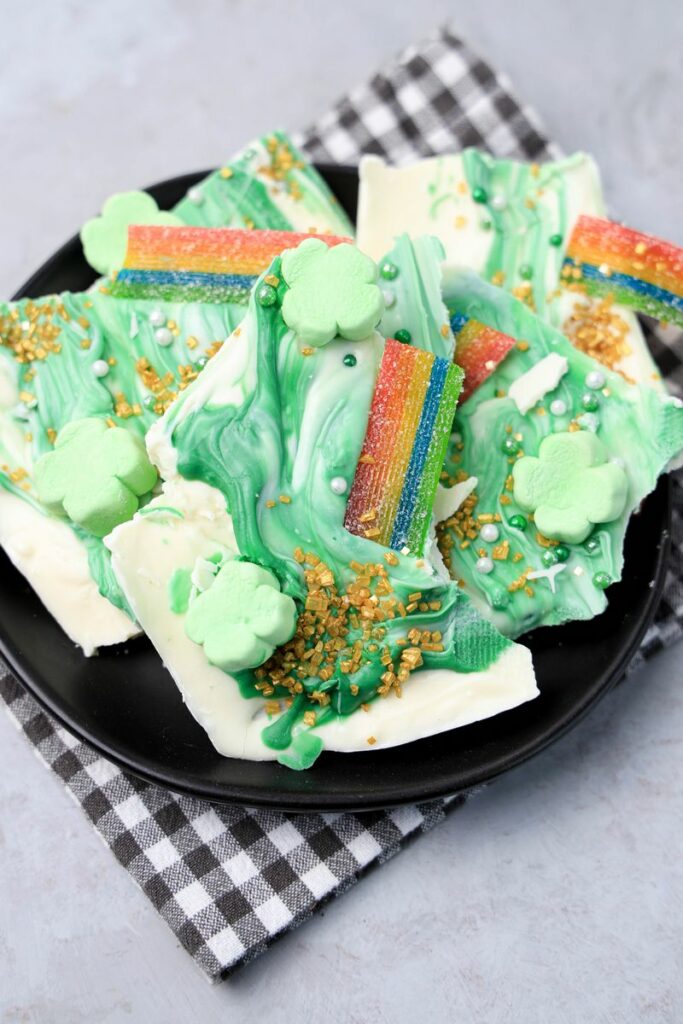 Lucky Leprechaun Bark on a black plate with a gray plaid napkin