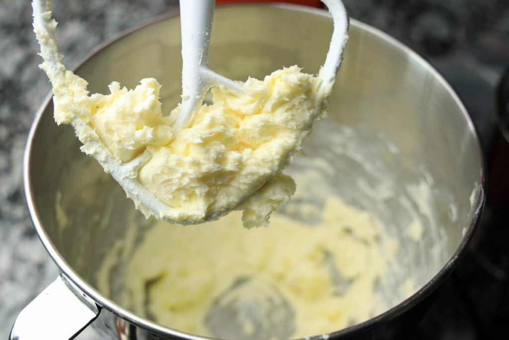 Frosting in the bowl of the stand mixer.