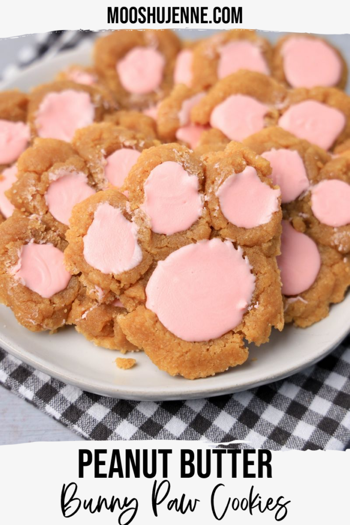 Peanut Butter Bunny Paw cookies are adorable for Easter cookies. Gluten free peanut butter cookie with pink candy melts for the pads. Fun to make with the entire family.