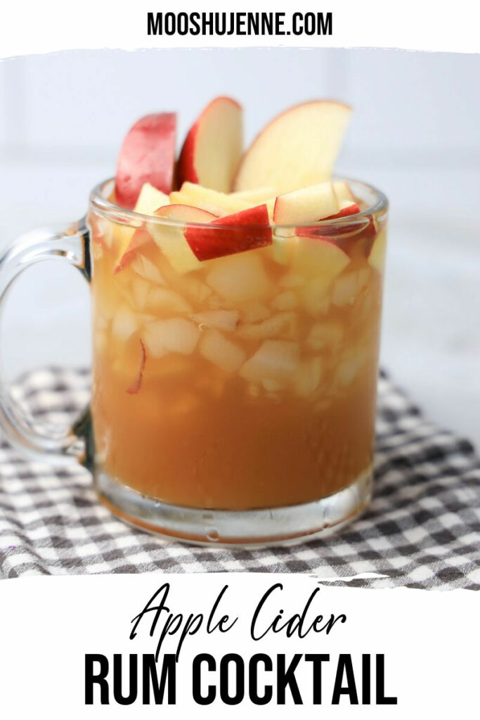 Apple cider rum cocktail is like Fall in a glass. A simple cocktail made with real apple cider, rum, and fresh apples. Wonderful for serving during Halloween or Thanksgiving.
