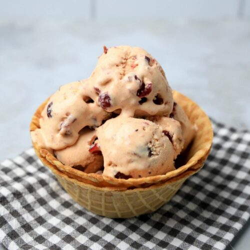 Cranberry ice cream is perfect for the holiday season. Sweet and tart with little ingredients to make. Make it in a stand mixer.