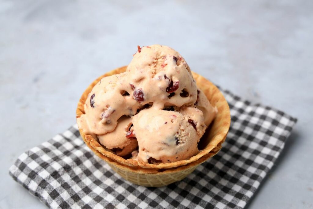 Cranberry ice cream is perfect for the holiday season. Sweet and tart with little ingredients to make. Make it in a stand mixer.