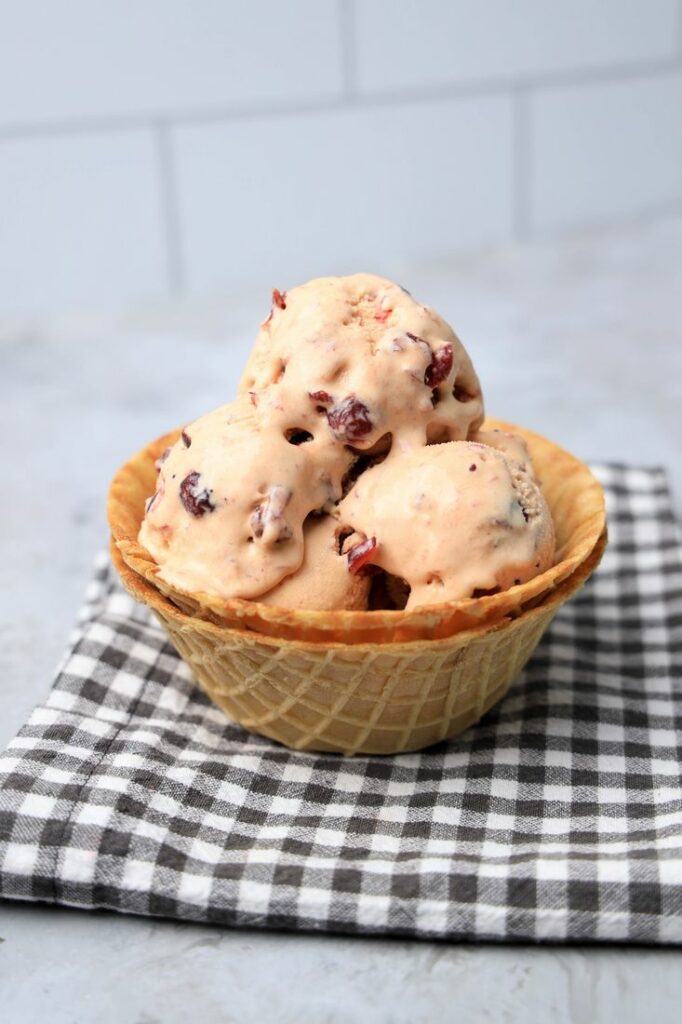 Cranberry ice cream is perfect for the holiday season. Sweet and tart with little ingredients to make. Make it in a stand mixer.