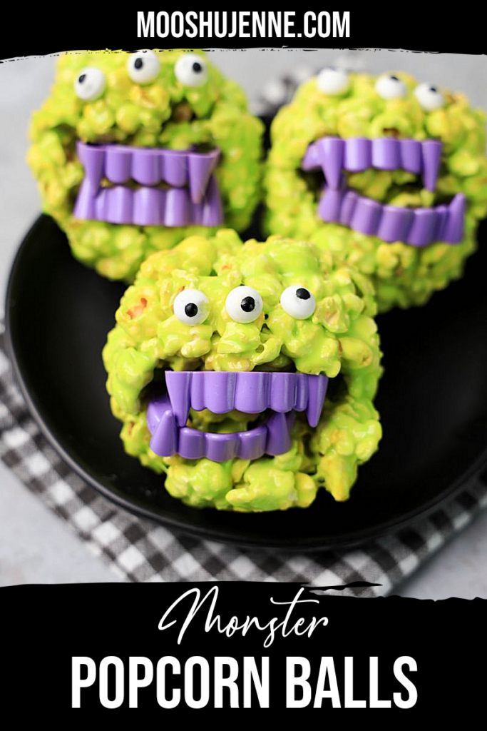 Monster Popcorn Balls with candy eyes and purple vampire teeth.