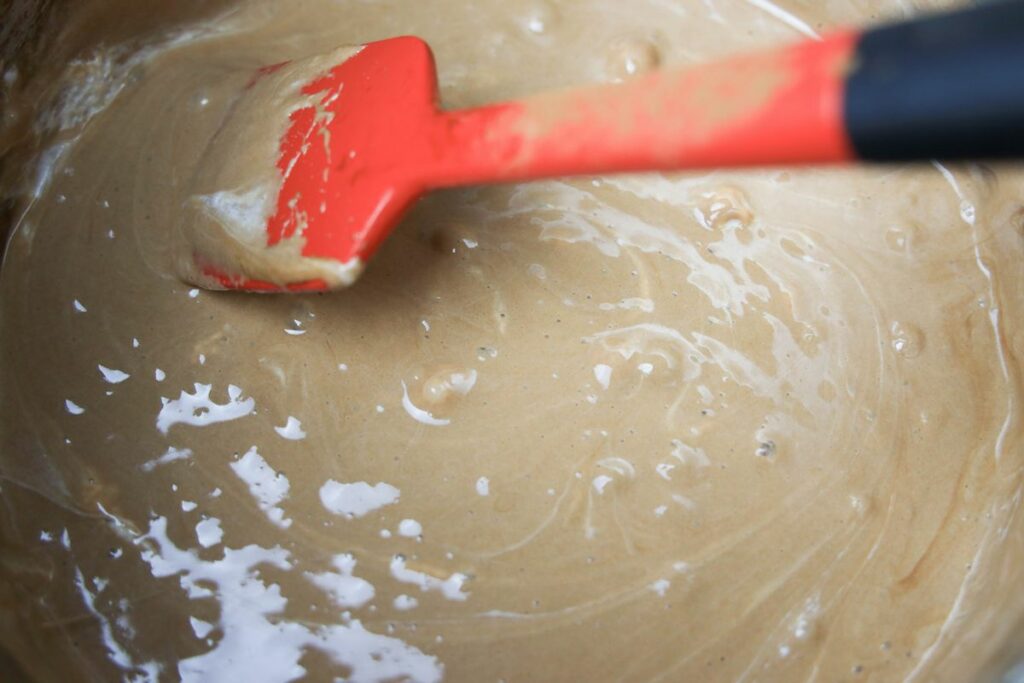 Cocoa and marshmallow mix melted down in a pan.