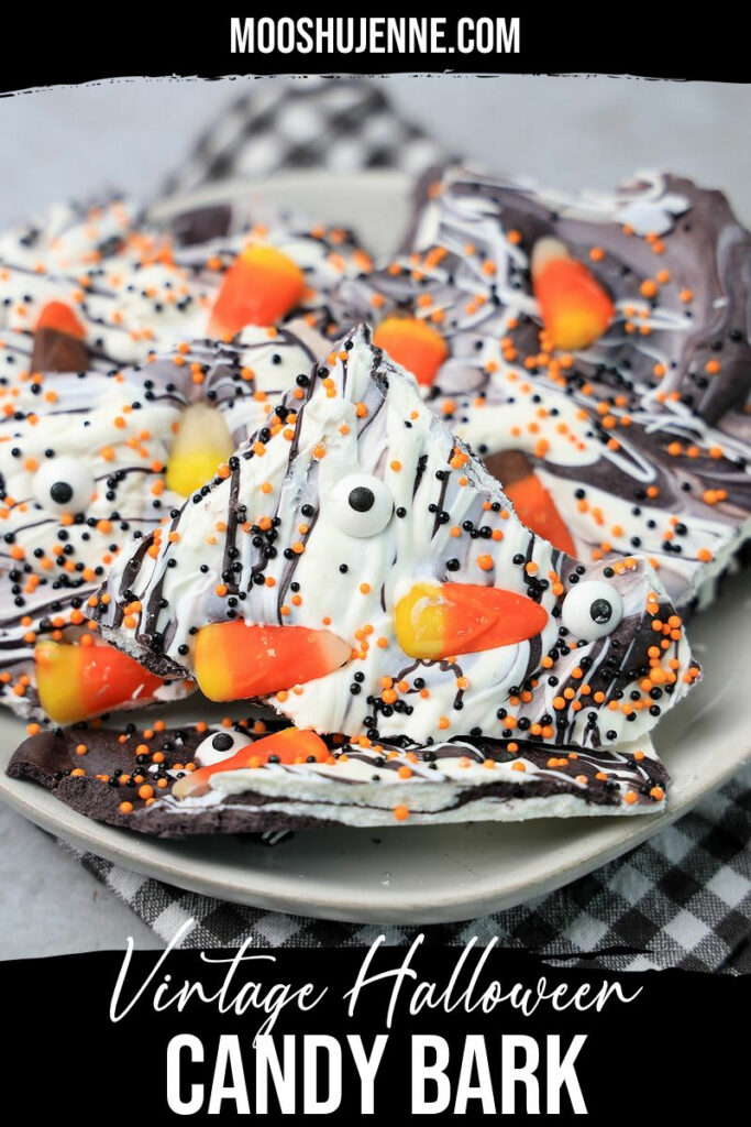 Vintage Halloween bark on a white plate with a gray plaid napkin.