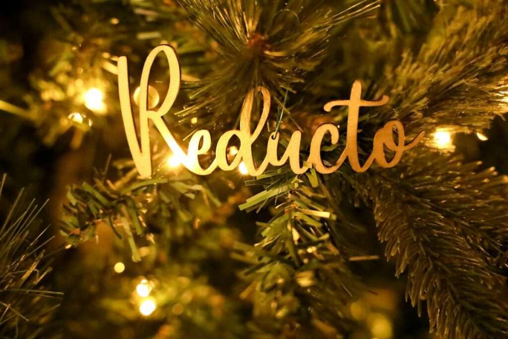 Reducto ornament on the tree with lights.